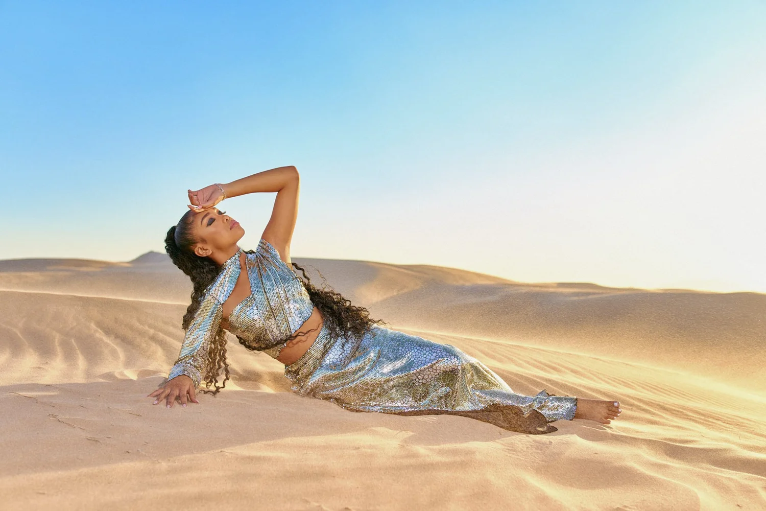Las Vegas portrait photography — silver outfit on the sand dunes at sunset
